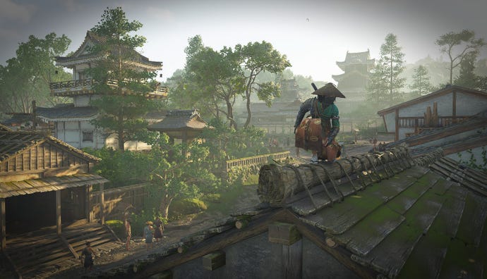 Naoe perches on a city rooftop in Assassin's Creed Shadows.