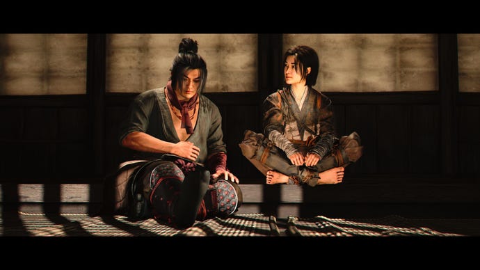 Naoe sits next to Gennojo, one of the the recruitable and romancable characters in Asssassin's Creed Shadows.