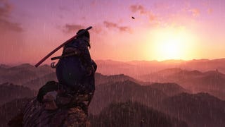 Naoe, the protagonist in Assassin's Creed Shadows, kneels on the top of a viewpoint on a large tree and looks towards a sunrise over a forest.