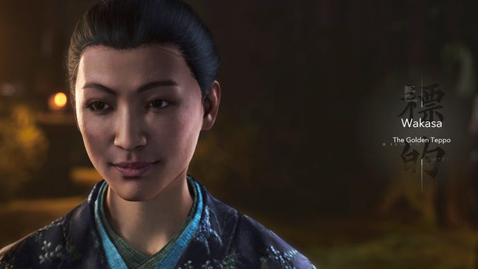 A close-up of Wakasa's face in Assassin's Creed Shadows as she is revealed by text on the right-hand side to be the Golden Teppo boss enemy.