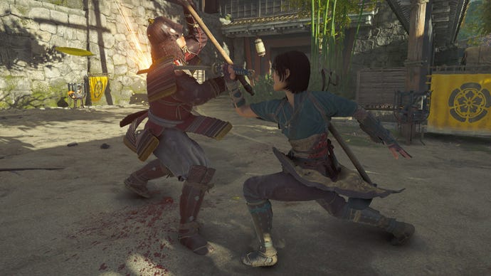 Naoe uses her katana to stab a foe in the shoulder in Assassin's Creed Shadows.