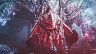 Arkveld, a large monster in Monster Hunter Wilds, bears down upon the camera with a red glow on its face.