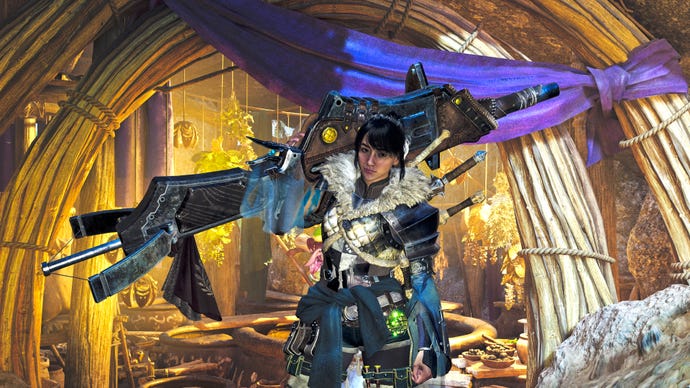 A female hunter in Monster Hunter Wilds poses in front of the camera with their weapon of choice, the Heavy Bowgun.