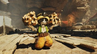 A Monster Hunter Wilds palico wearing a mining helmet while carrying two bundles of wood.