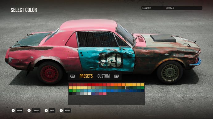 The player paints their car pink and blue in a game menu with a palette of colours displayed.